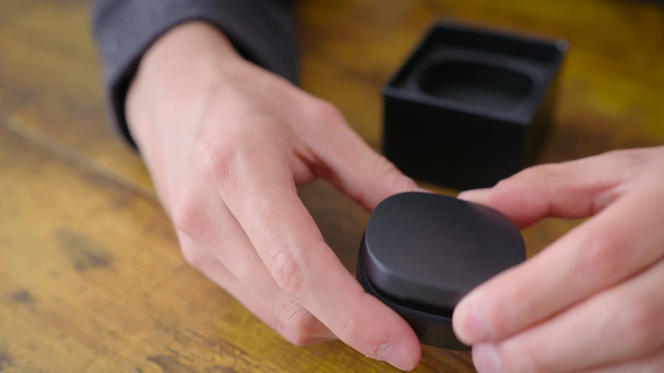 Take the ring out of its box and remove the plastic cover.