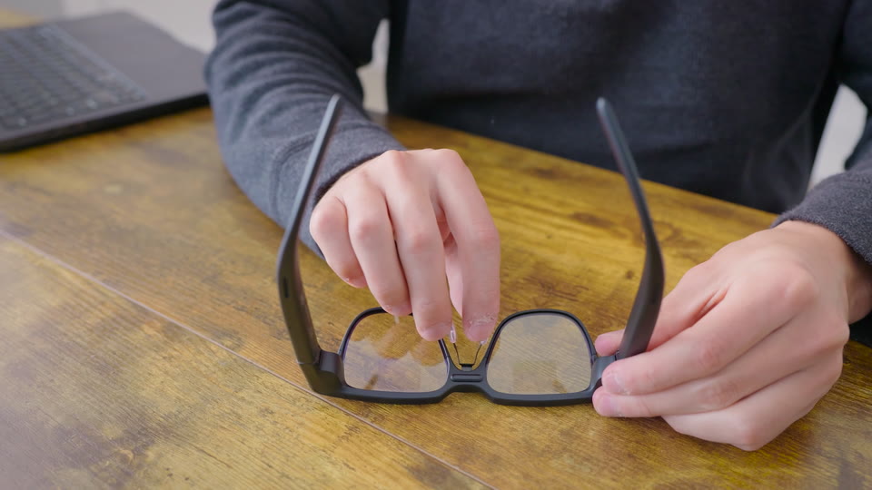 Hold the base of the nose bridge and pull firmly.