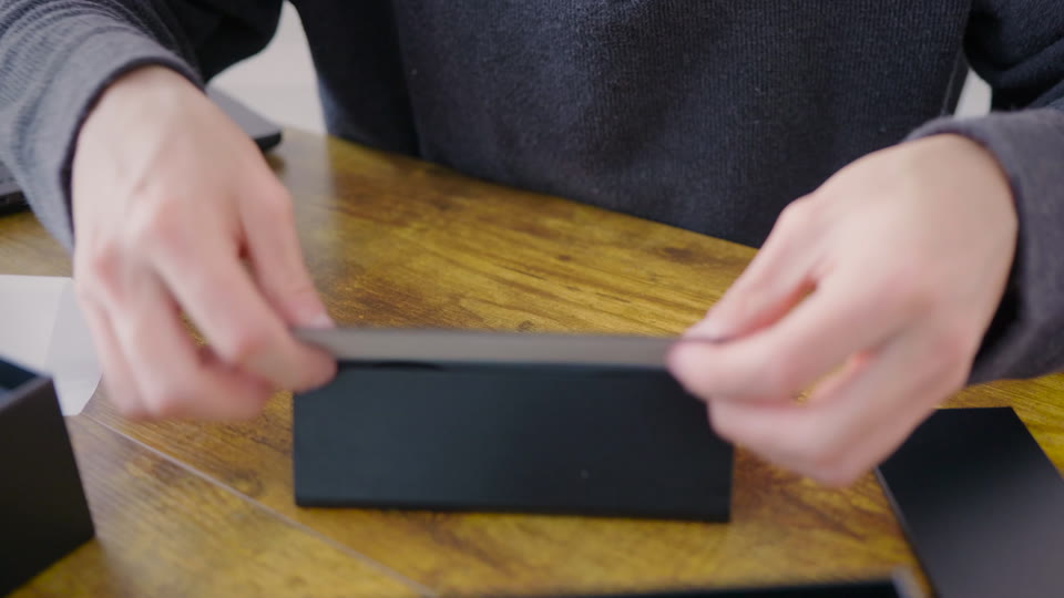 Open the case and peel the covers off the lenses.